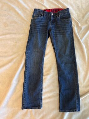 Levi's Indigo Blue Straight Leg Jeans with Red Waistband Accent